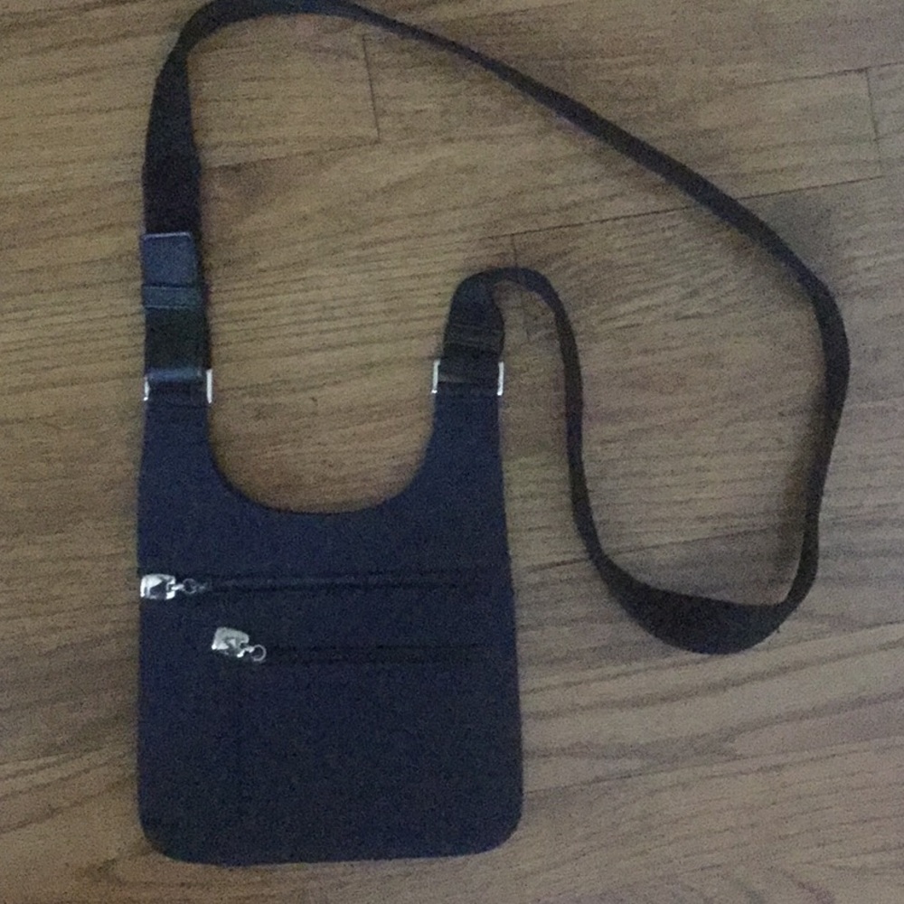 Nine West Navy Crossbody with black strap.